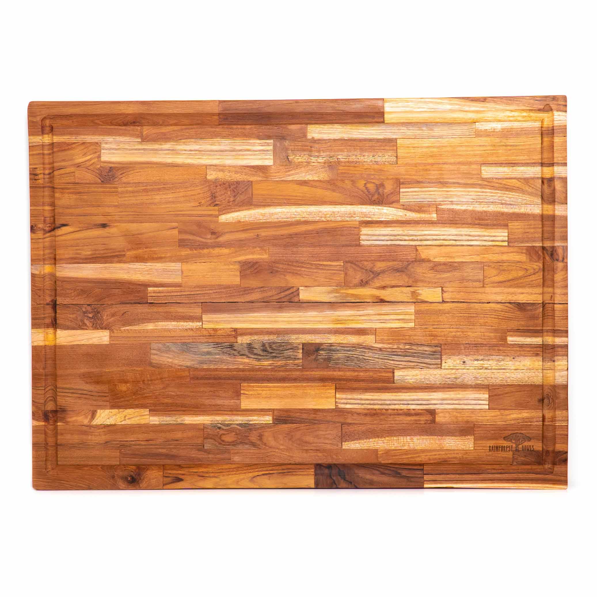 http://rainforestbowls.com/cdn/shop/products/RectangularTeakWoodCuttingBoard_23x17_withJuiceGroove-ExtraLarge1.jpg?v=1656085796